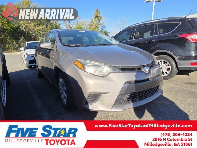 Used 2016 Brown Toyota LE image 1
