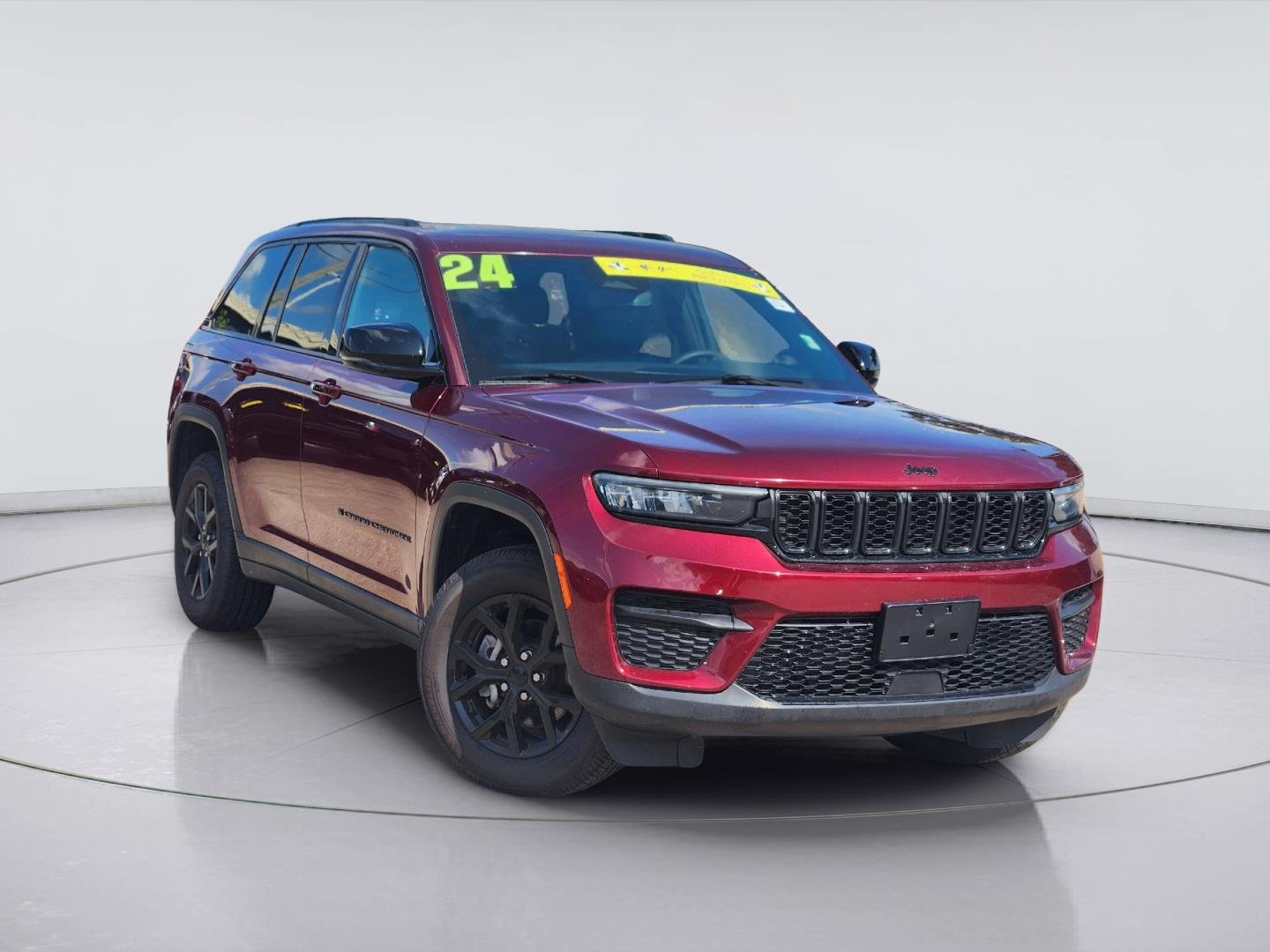 Used 2024 Velvet Red Pearlcoat Jeep Altitude image 1