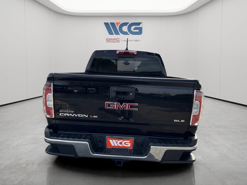 Used 2020 ONYX BLACK GMC 4WD SLE image 4