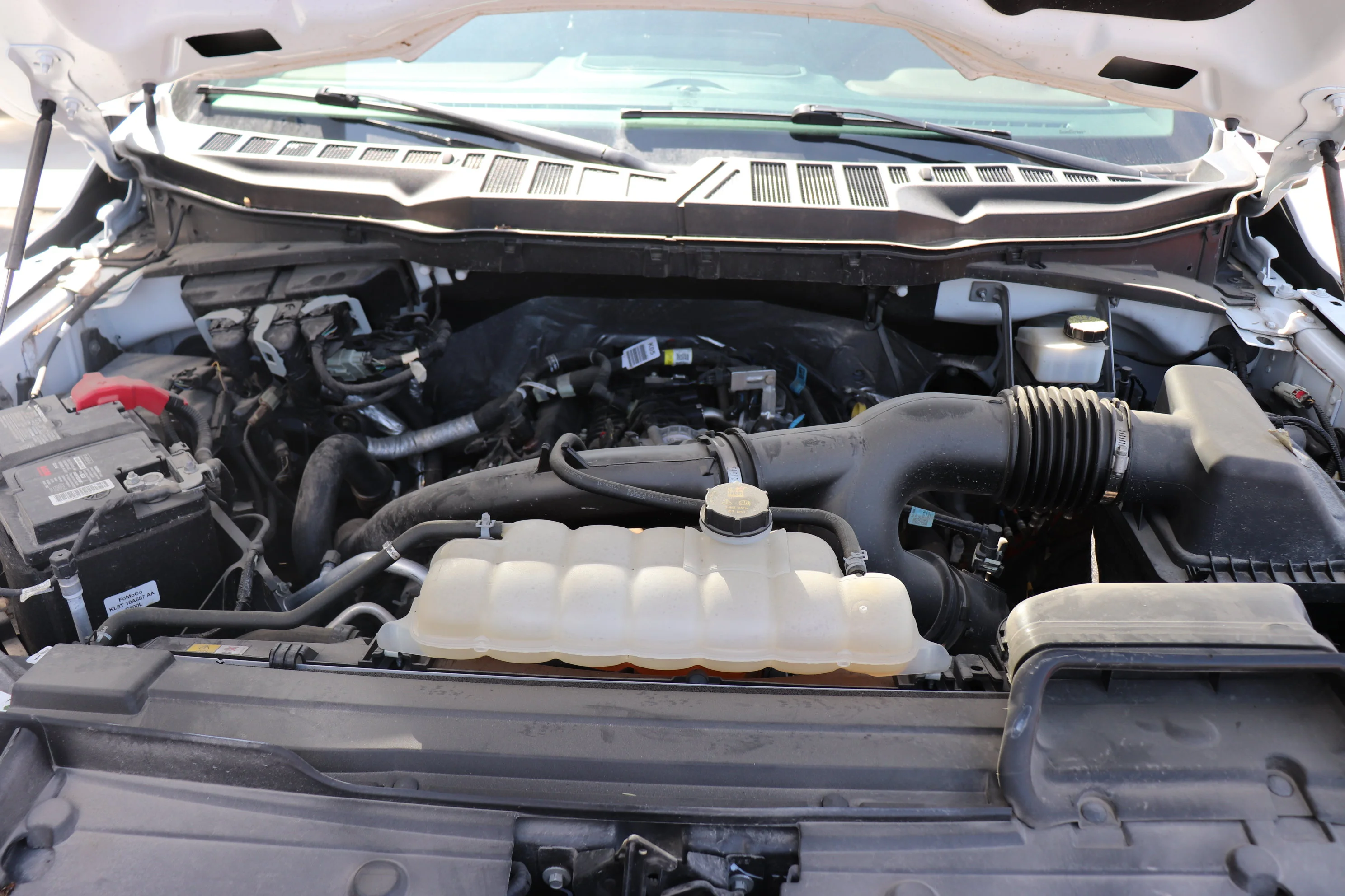 Certified Used 2023 Silver Ford Lariat 4WD SuperCrew 5.5