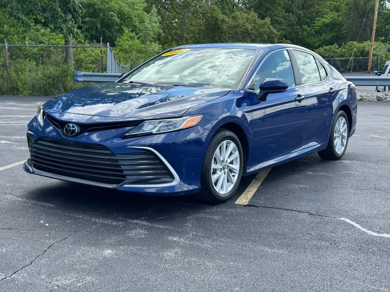 Used 2024 Reservoir Blue Toyota LE image 9