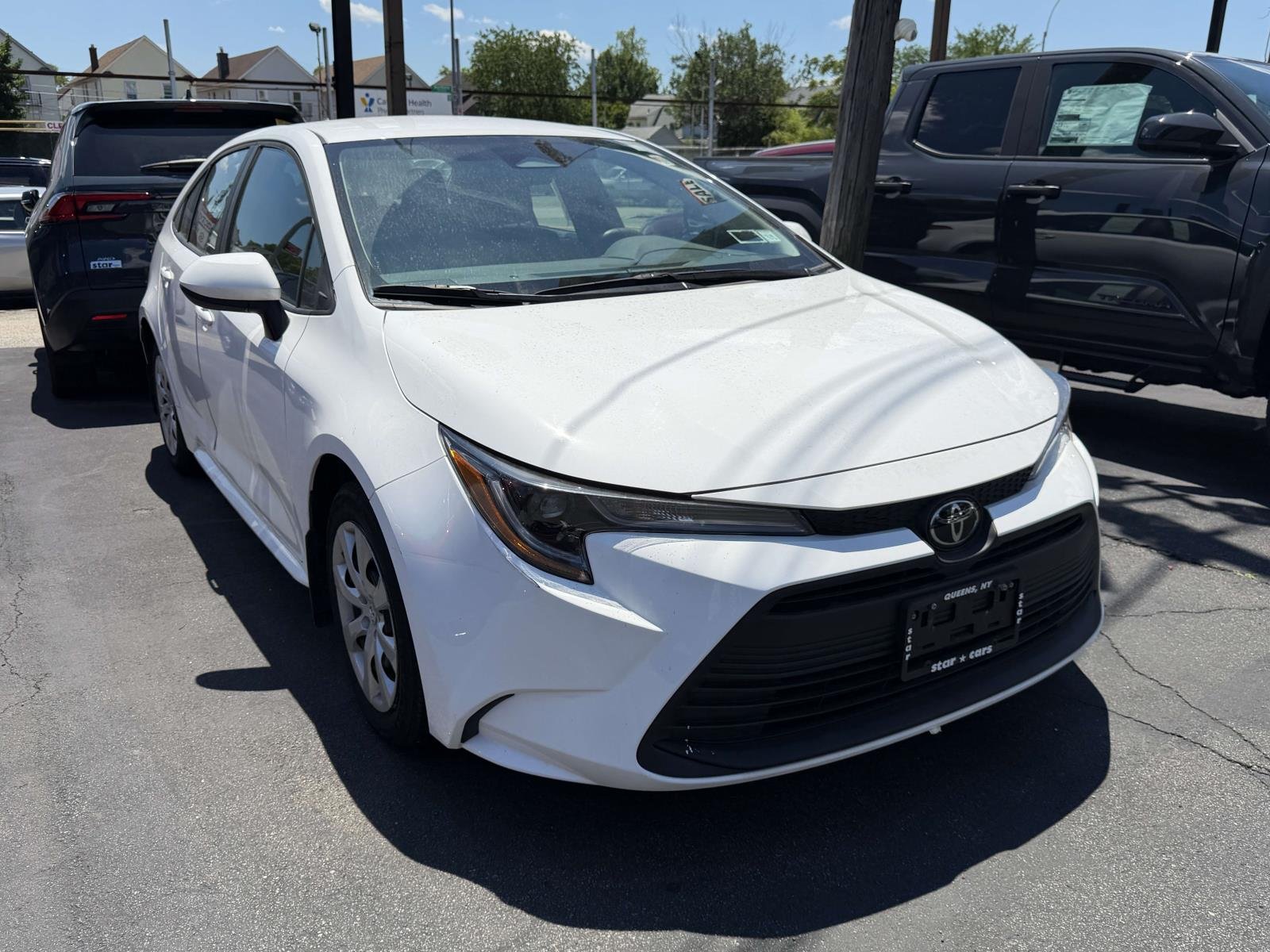 Used 2023 White Toyota LE CVT (Natl) image 1