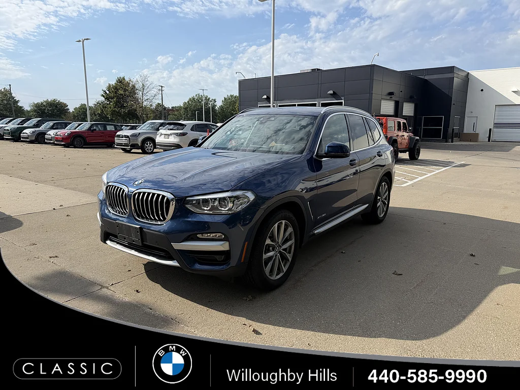 Used 2018 Phytonic Blue Metallic BMW xDrive30i image 1