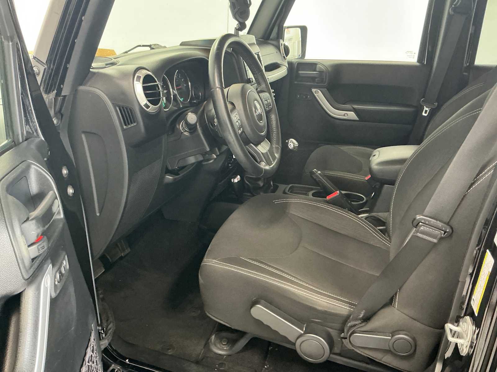 Used 2016 Black Clearcoat Jeep Sahara image 10