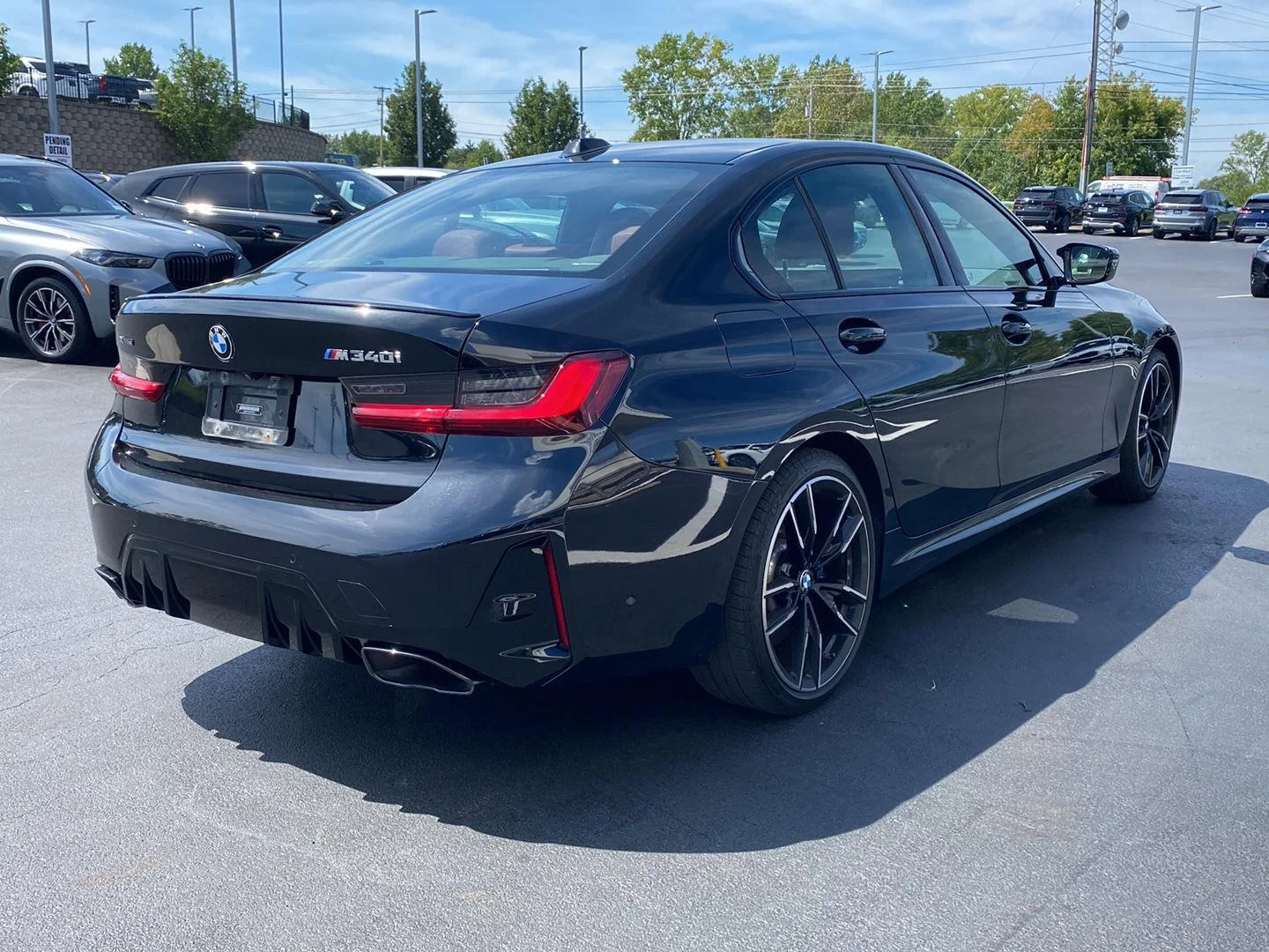 Used 2023 Black Sapphire Metallic BMW M340i xDrive image 3