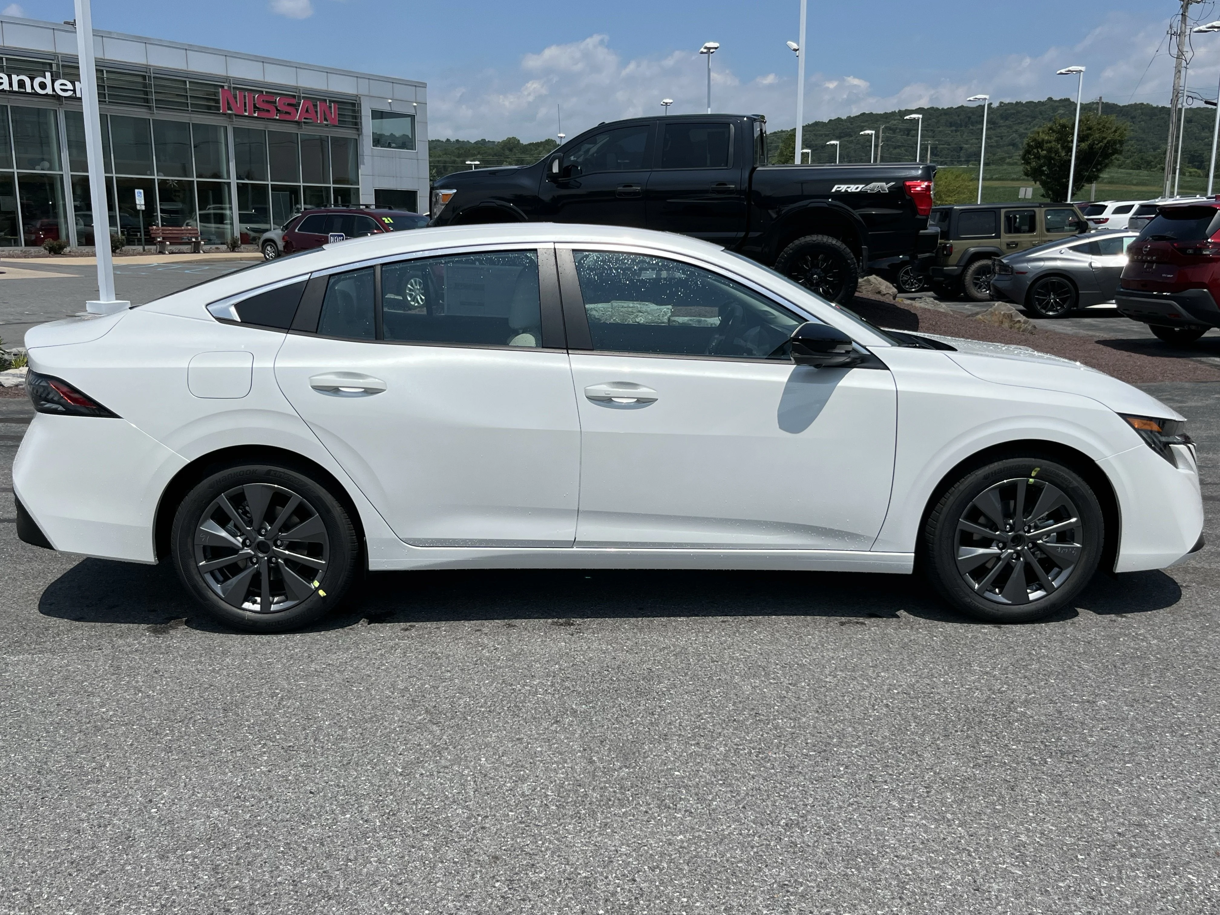 New 2026 Aspen White TriCoat Nissan SL image 2