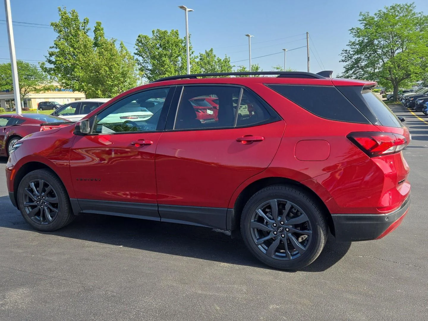 Used 2024 Radiant Red Tintcoat Chevrolet RS image 3
