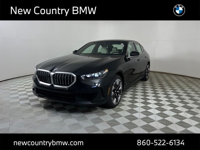New 2027 Black Sapphire Metallic BMW 550e xDrive image 3
