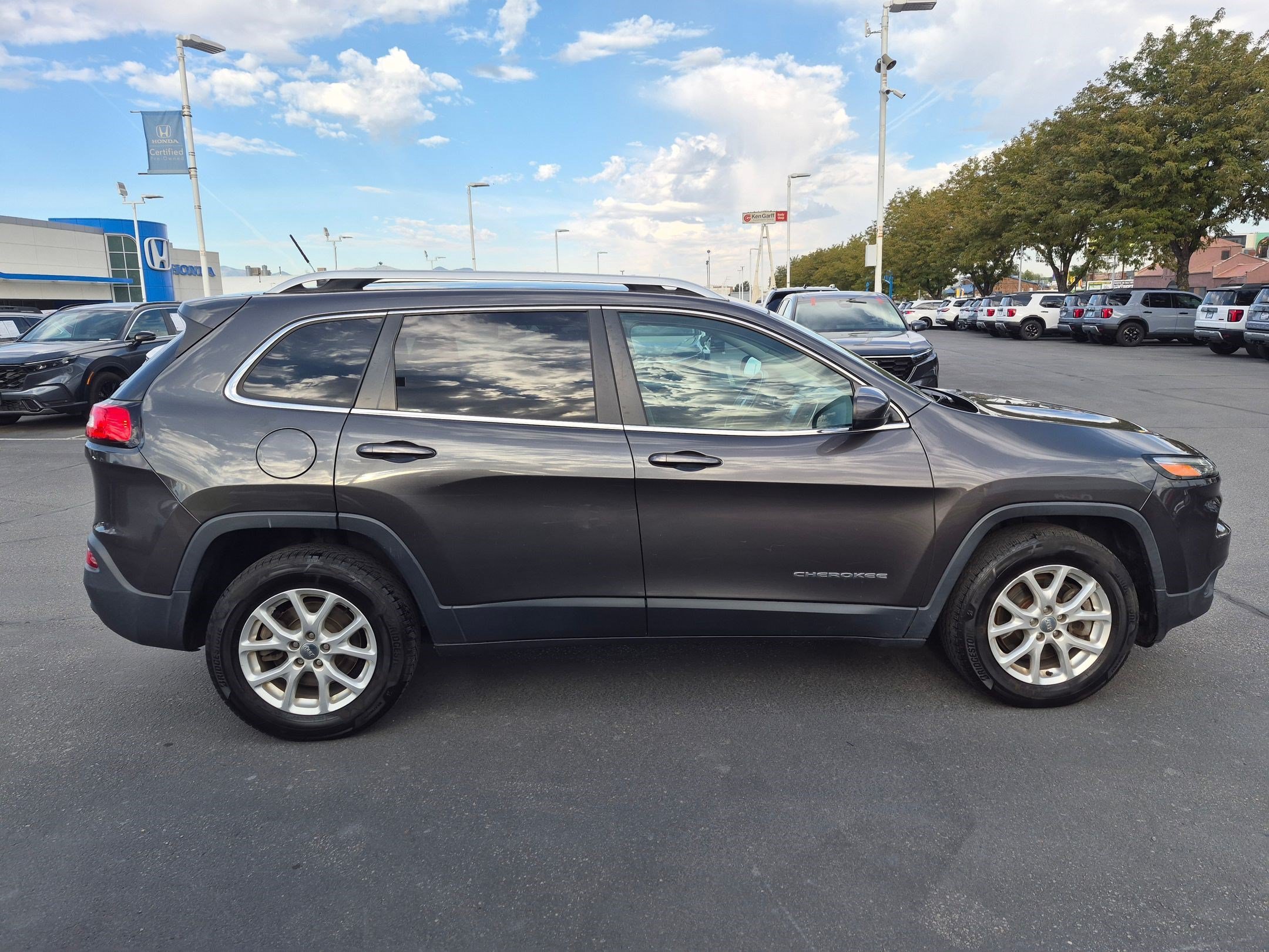 Used 2015 Jeep Cherokee Latitude with VIN 1C4PJMCB9FW702999 for sale in Salt Lake City, UT