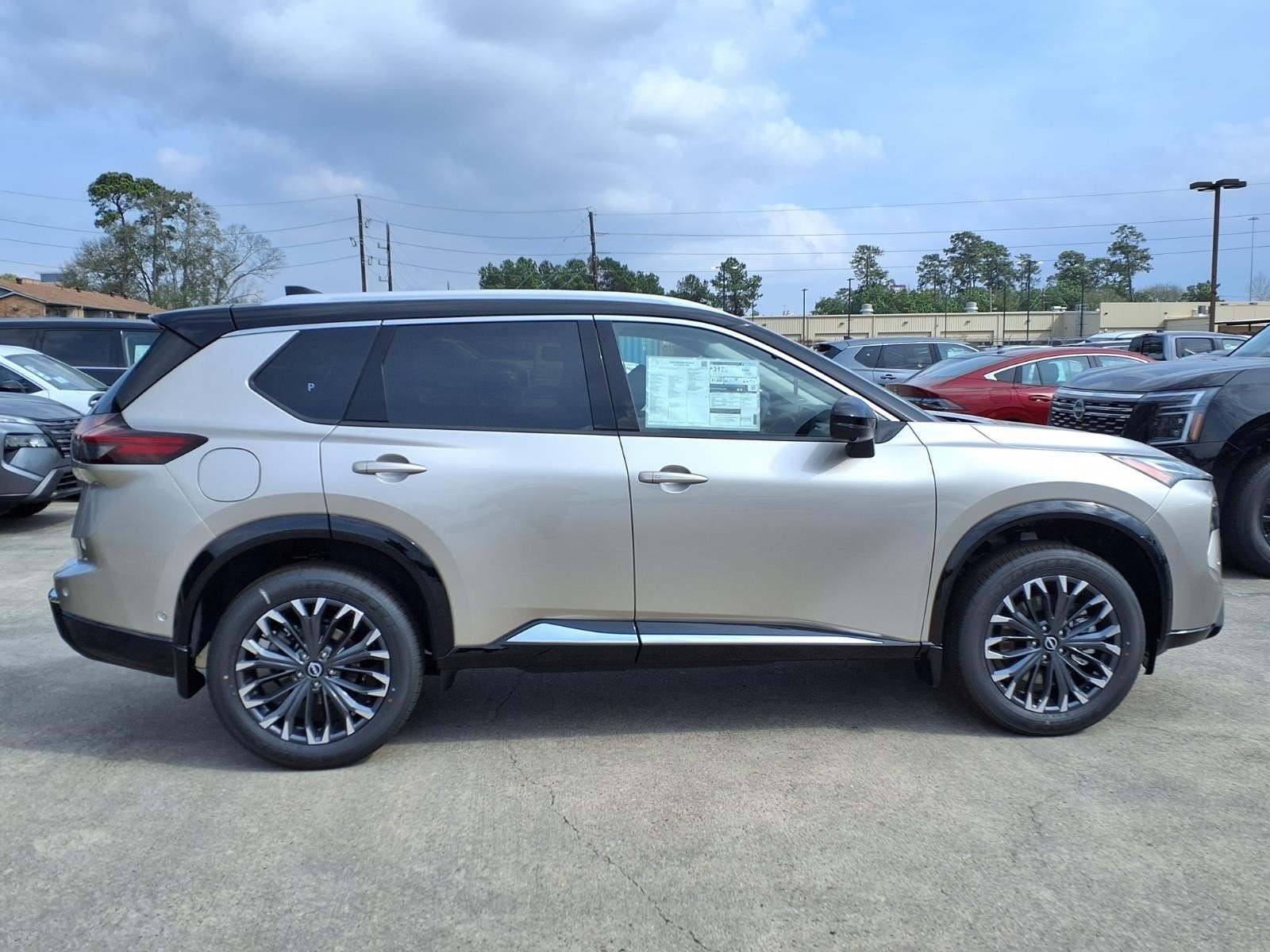 2026 Nissan Rogue Platinum Silver at Robbins Nissan