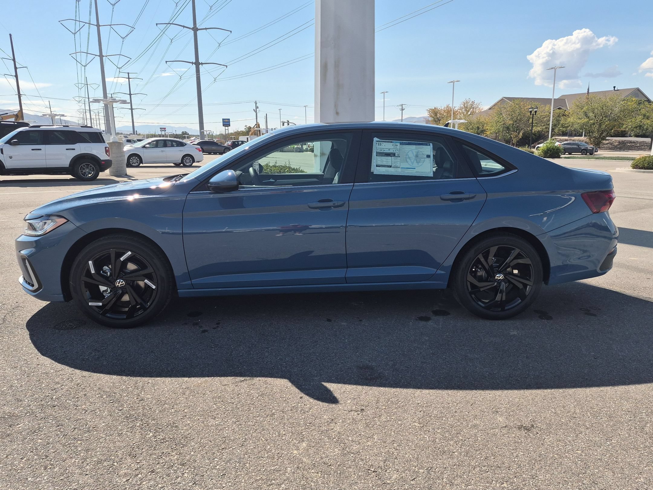New 2027 Monterey Blue Pearl Volkswagen SE image 7