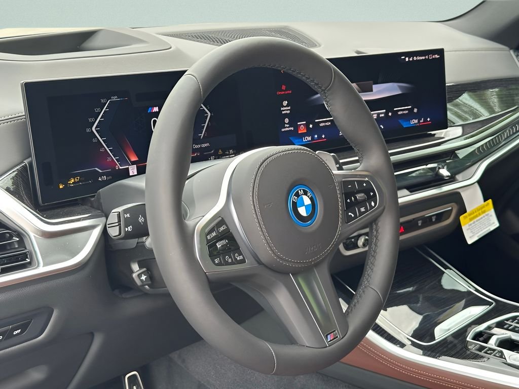 New 2026 Black Sapphire Metallic BMW xDrive50e image 13