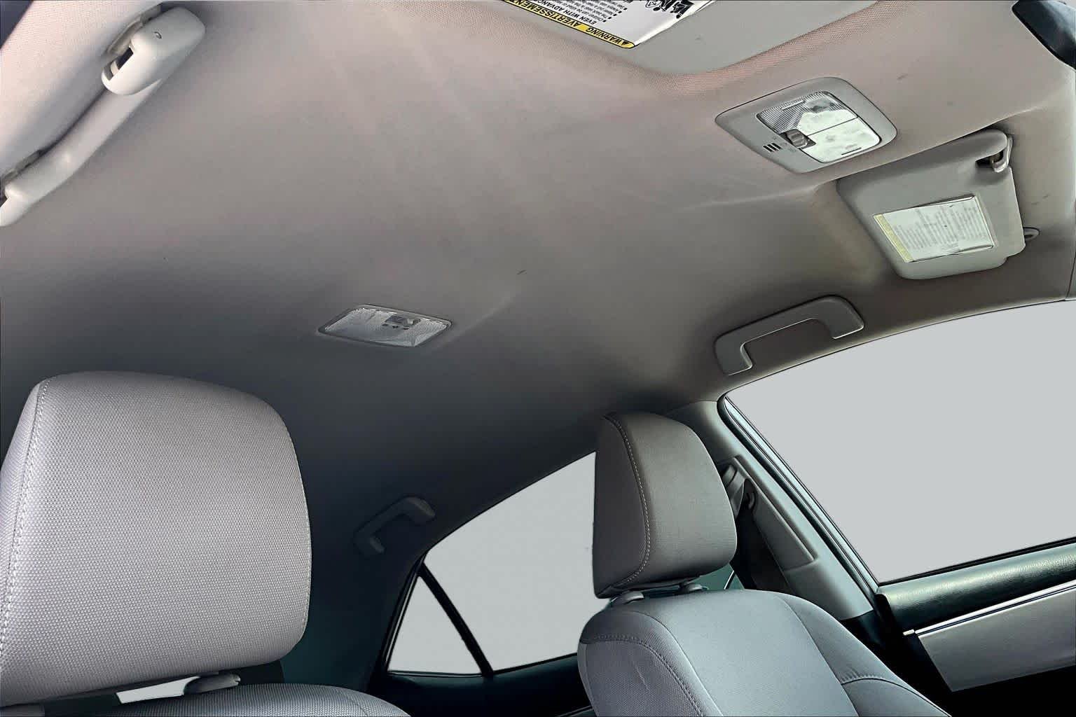 Used 2016 Classic Silver Metallic Toyota LE image 14
