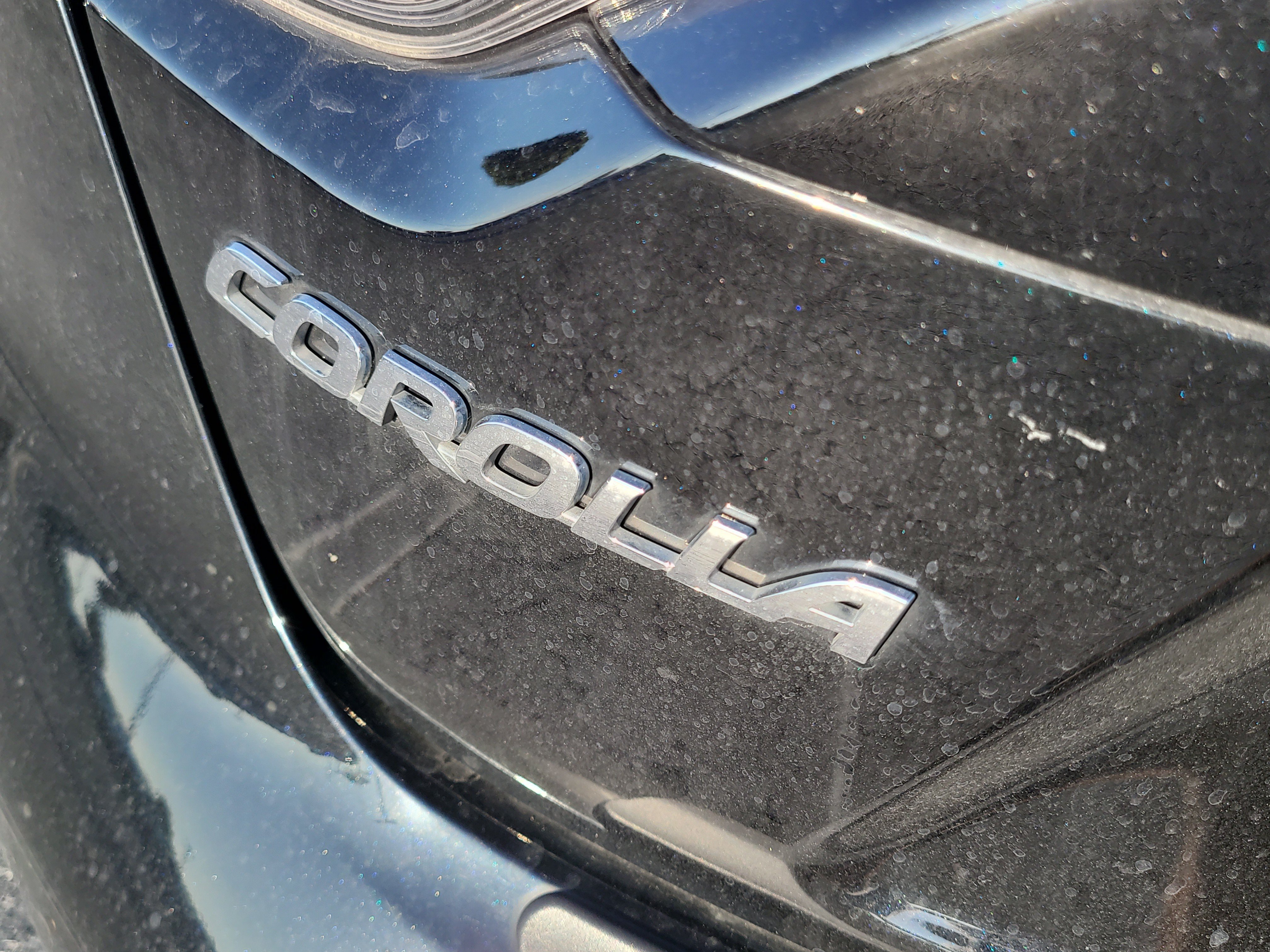 Used 2023 Midnight Black Metallic Toyota Hybrid LE image 10