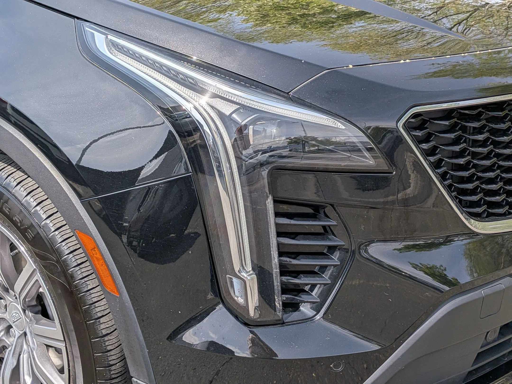 Used 2023 Stellar Black Metallic Cadillac Sport image 10