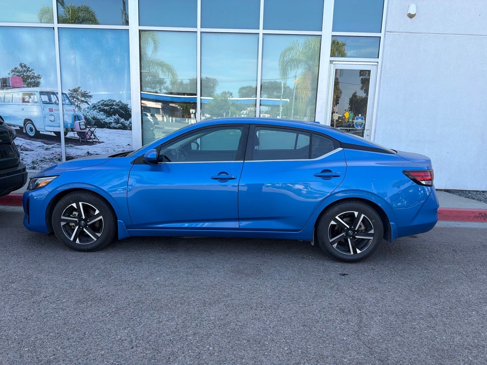 Used 2024 Electric Blue Metallic Nissan SV image 8