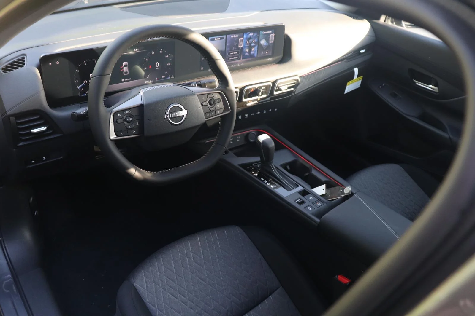 New 2026 Gun Metallic Nissan SV image 7