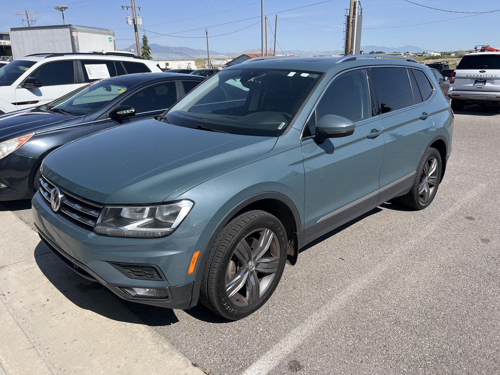 Used 2020 BLUE Volkswagen SE image 1