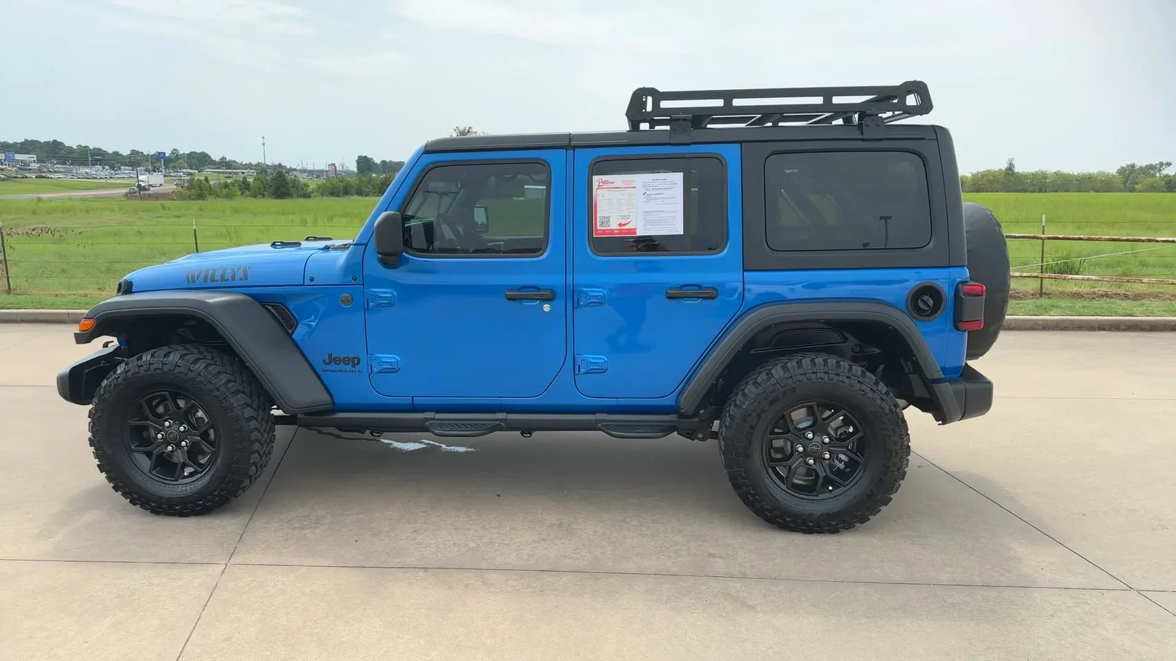Used 2024 Hydro Blue Pearl Coat Jeep Sport image 6