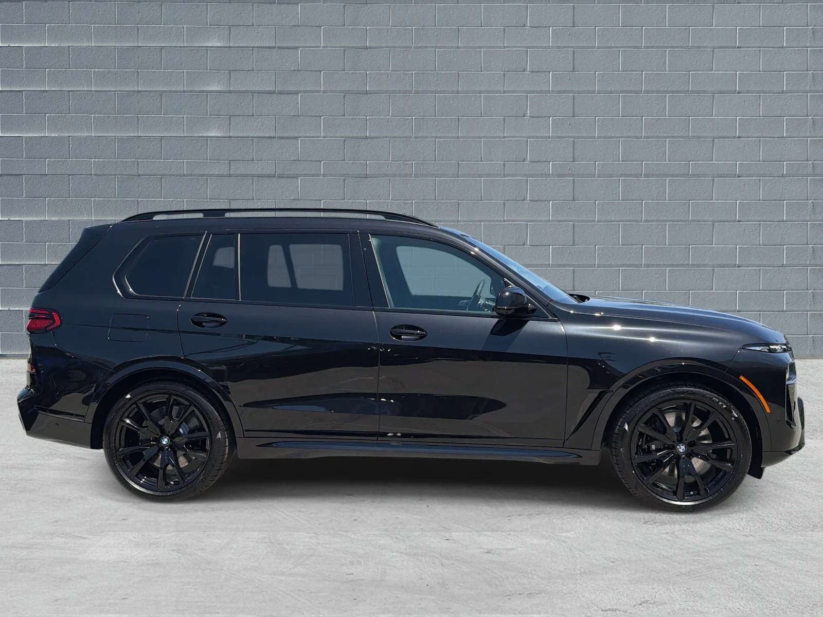 New 2026 Black Sapphire Metallic BMW M60i Sports Activity Vehicle image 3
