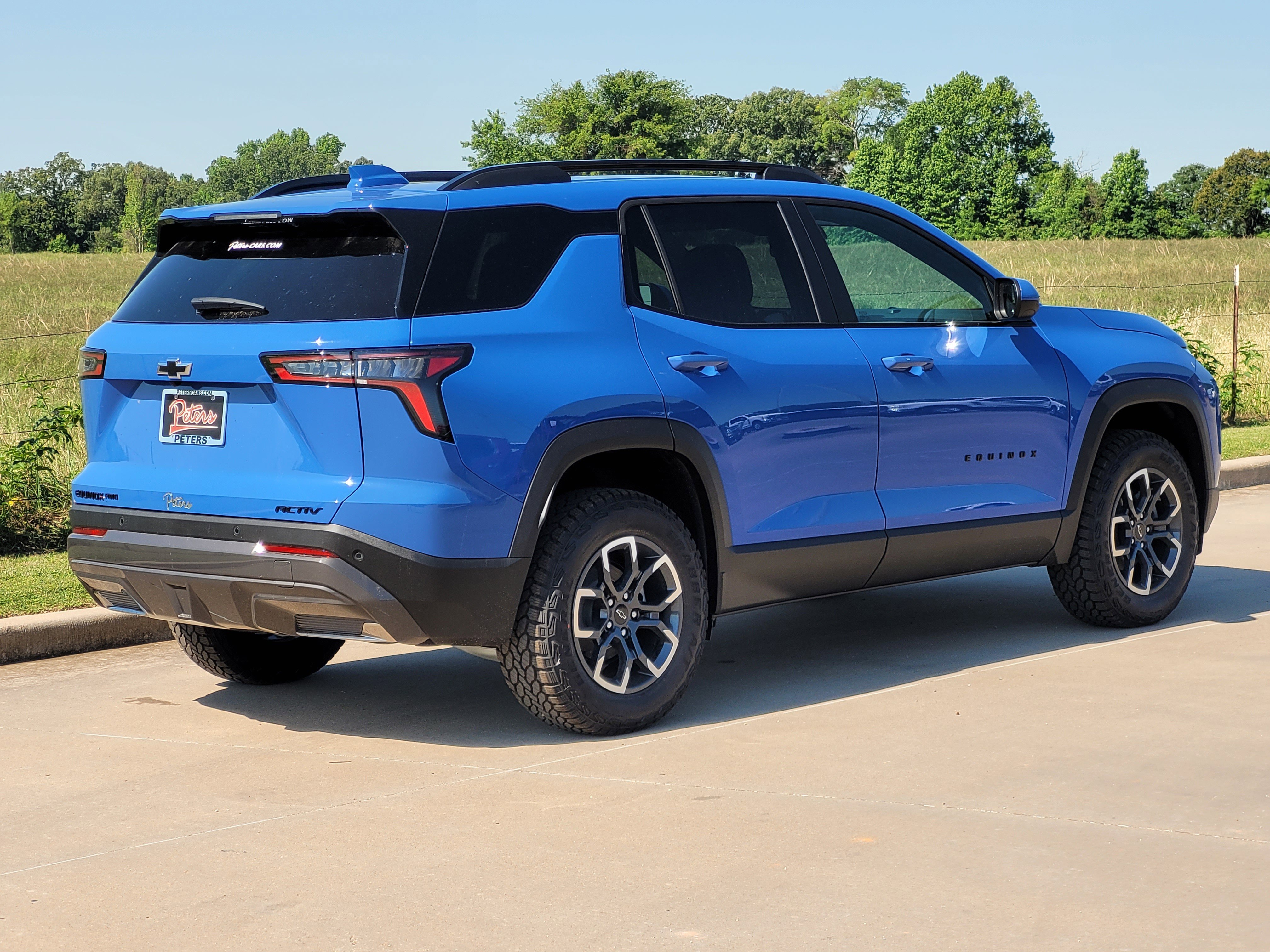 New 2026 Reef Blue Metallic Chevrolet AWD ACTIV image 3