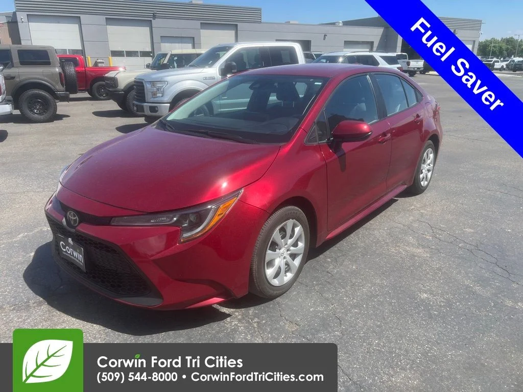 Used 2022 Ruby Flare Pearl Toyota LE image 1