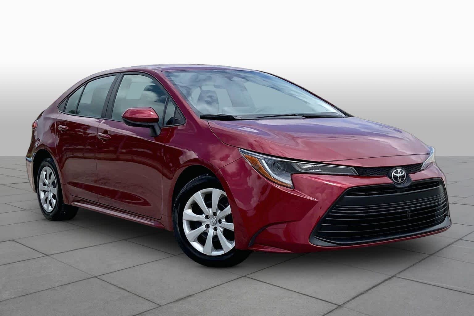Used 2024 Ruby Flare Pearl Toyota LE image 3