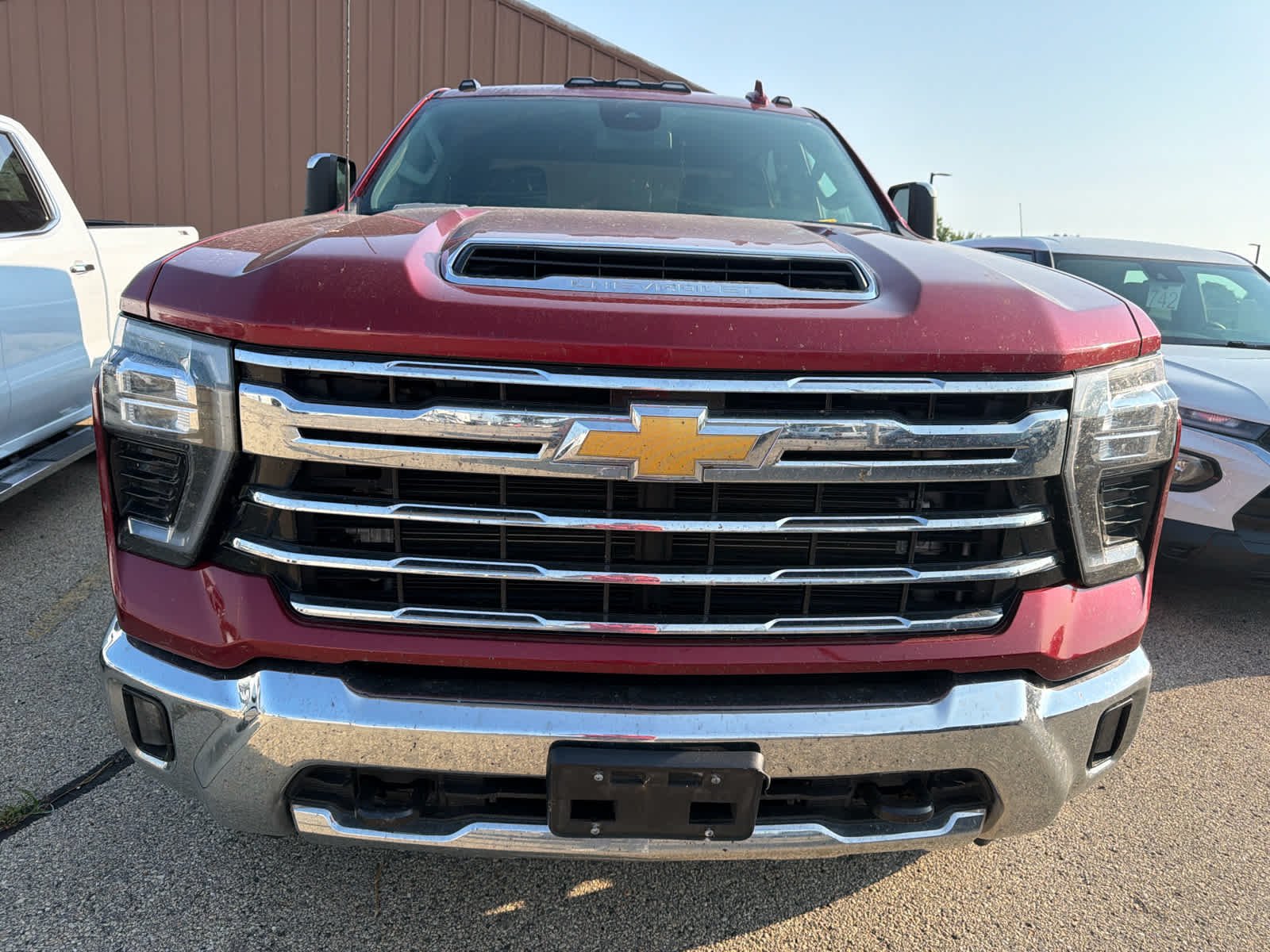 Used 2024 Radiant Red Tintcoat Chevrolet LTZ image 2