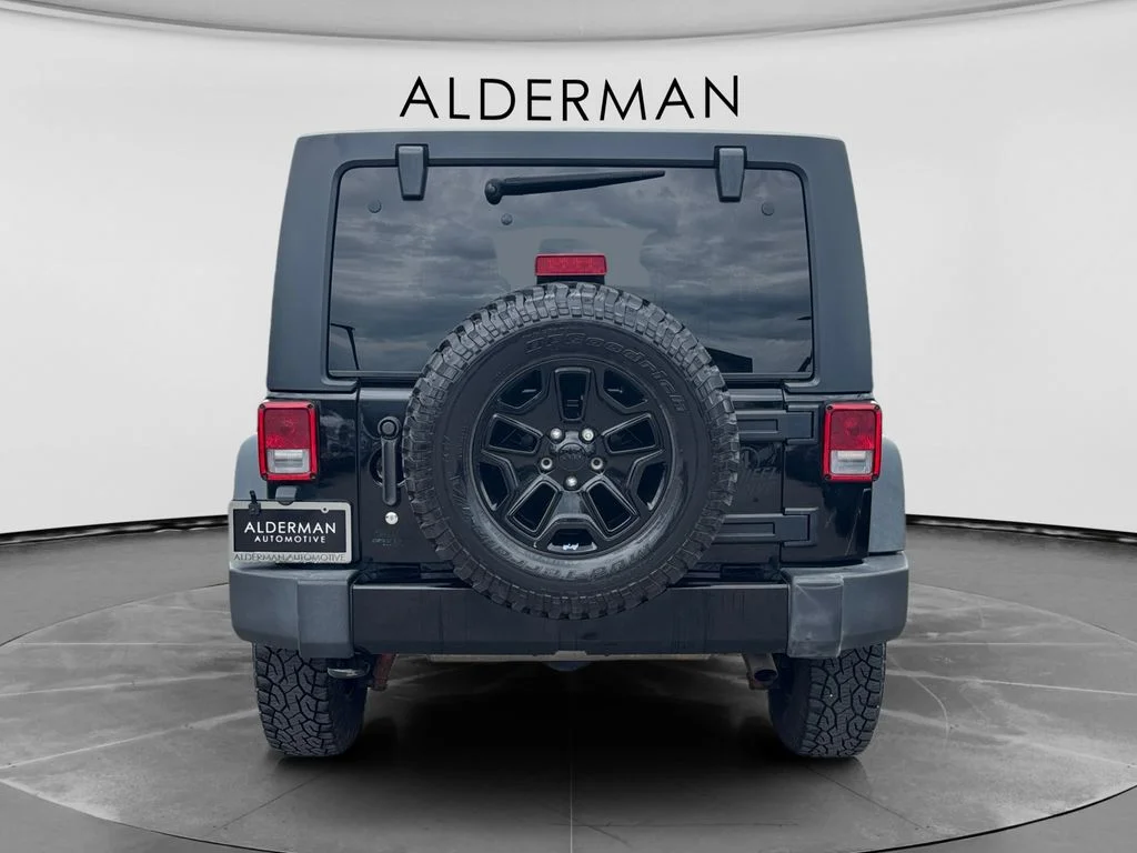 Used 2018 Black Jeep Unlimited Sport image 4