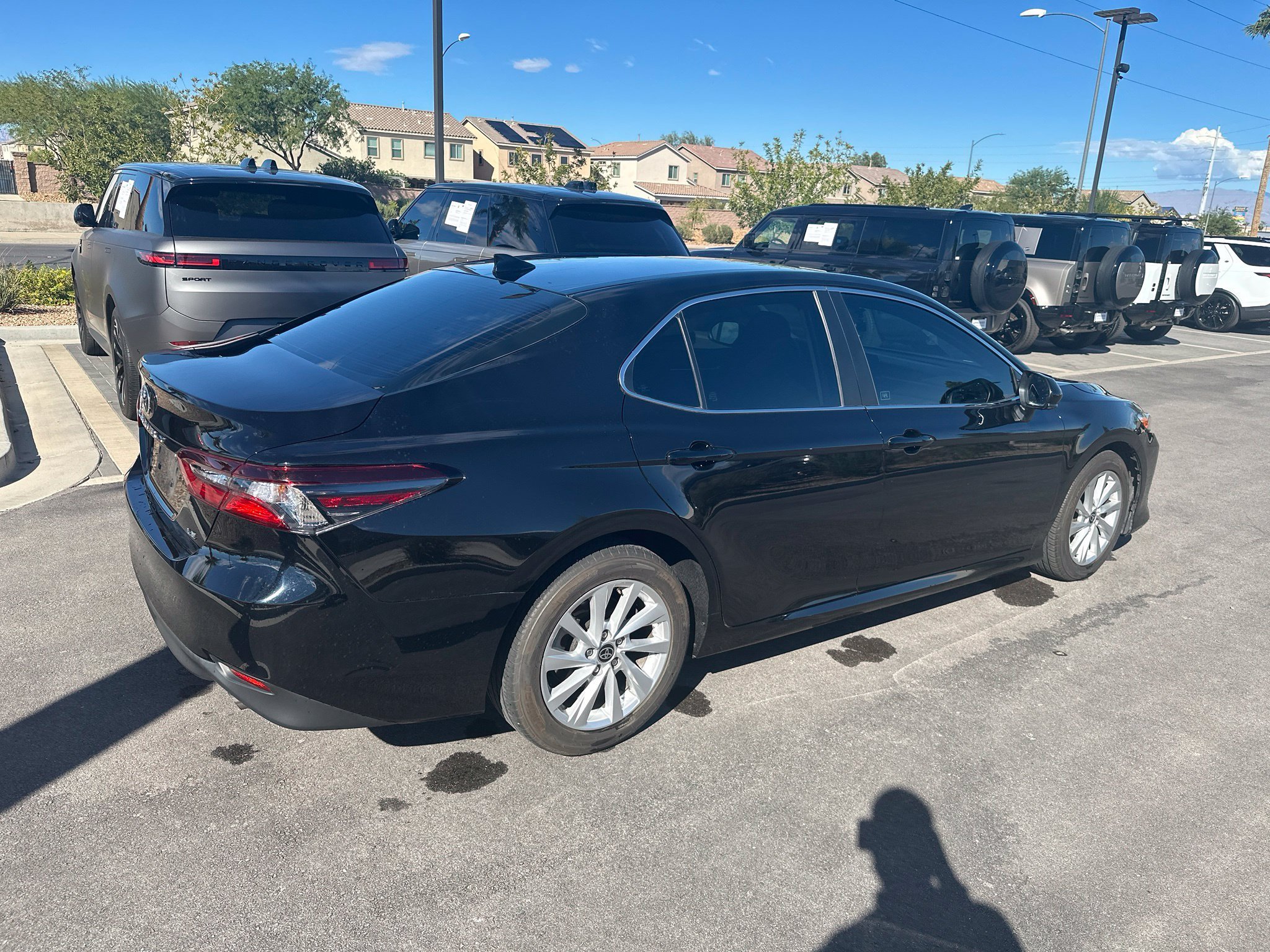 Used 2022 Midnight Black Metallic Toyota LE image 3