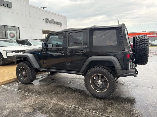Used 2013 Jeep Wrangler Unlimited Sahara with VIN 1C4BJWEG4DL630929 for sale in Brazil, IN