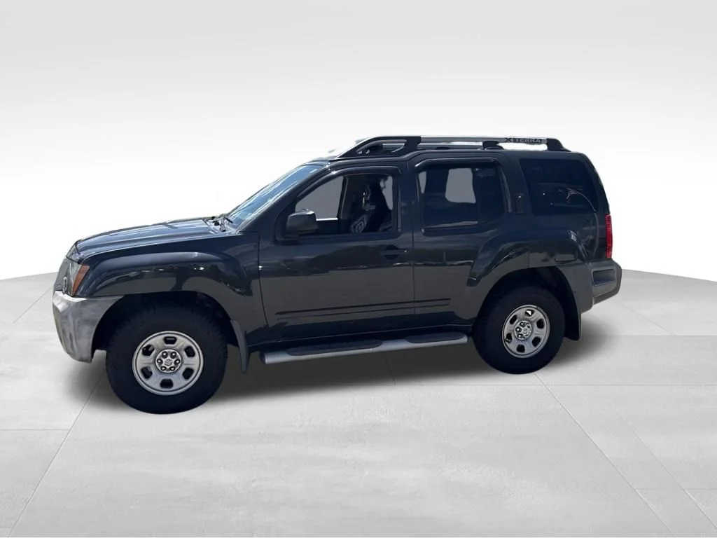Used 2011 Black Nissan X image 2
