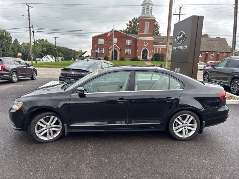 Used 2017 Volkswagen Jetta SEL with VIN 3VWL17AJ7HM289099 for sale in Massillon, OH