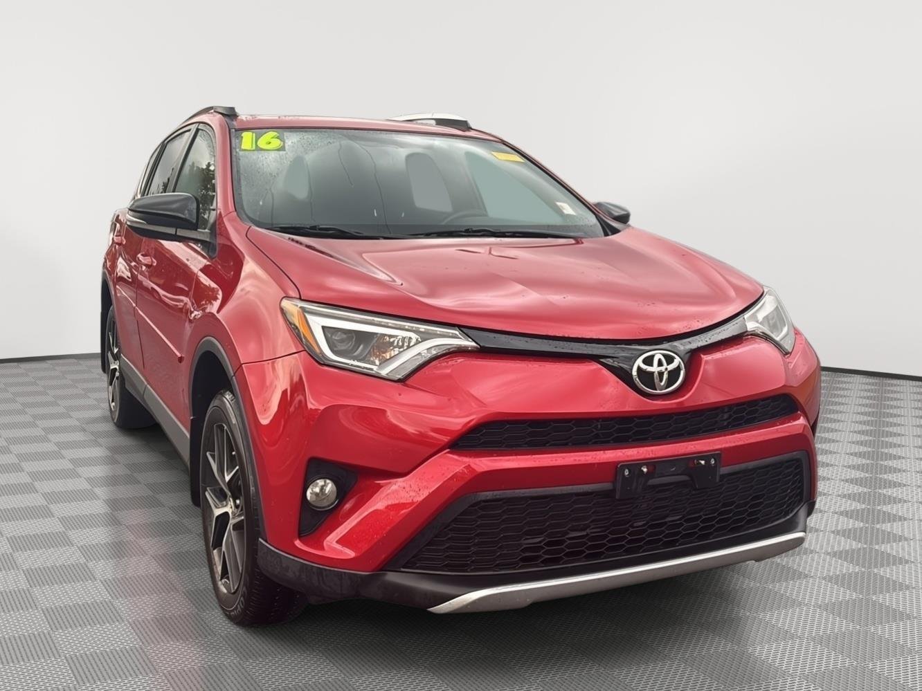 Used 2016 Barcelona Red Metallic Toyota SE image 1