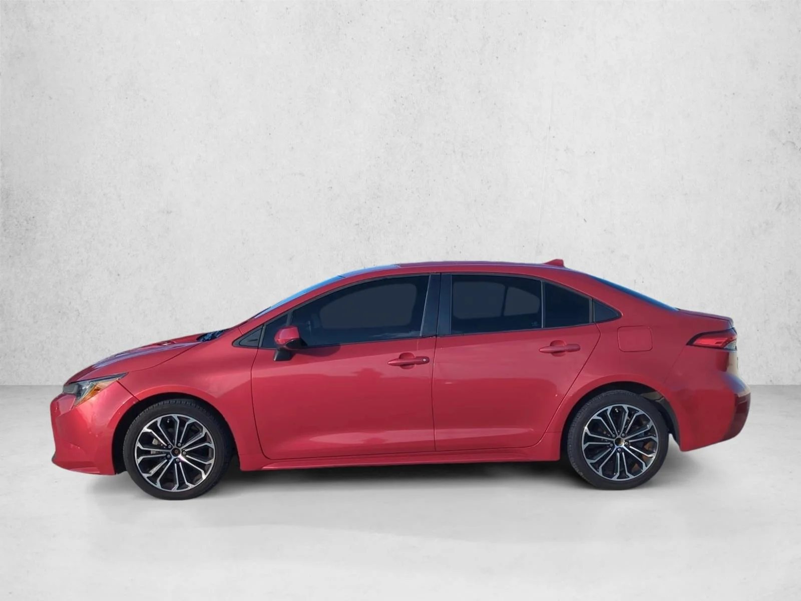 Used 2020 Barcelona Red Metallic Toyota LE image 5