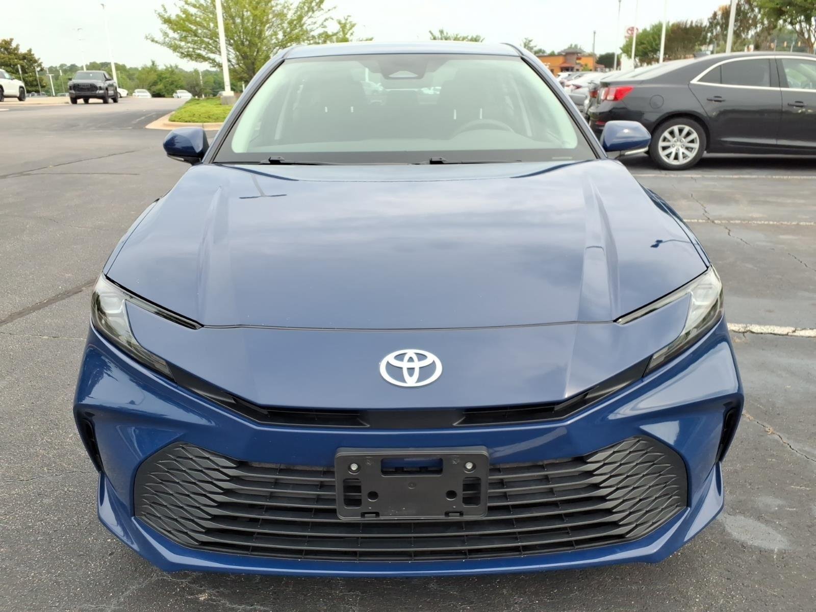 Used 2025 Reservoir Blue Toyota LE image 9