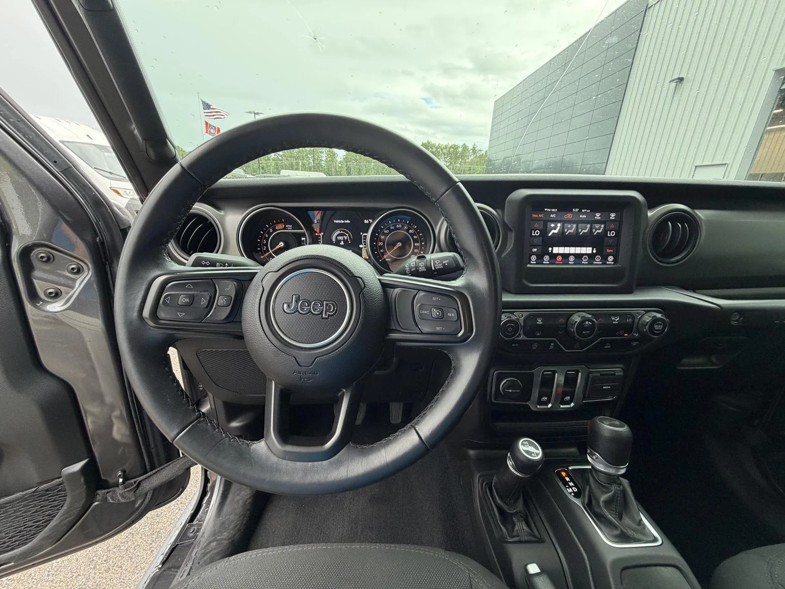 Used 2022 Granite Crystal Metallic Clearcoat Jeep Sport S image 8