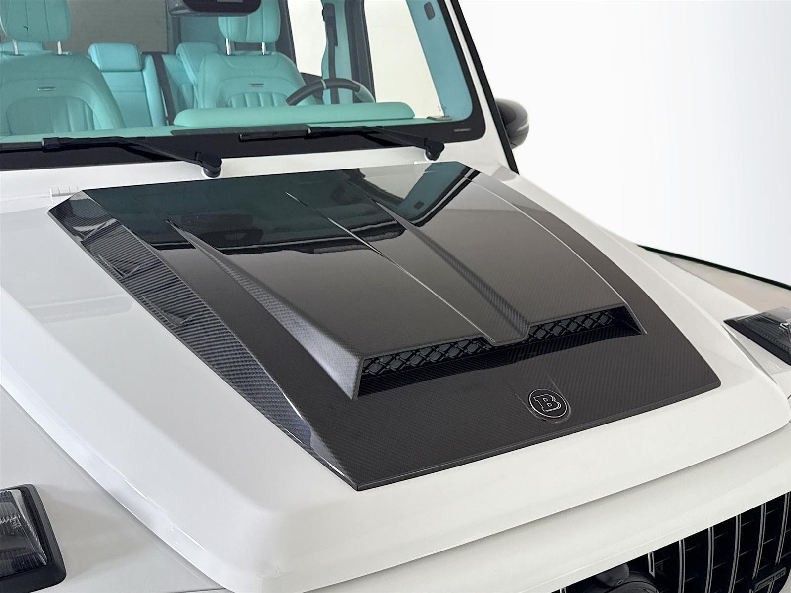 Used 2024 Polar White Mercedes-Benz AMG® G 63  Brabus Custom Widebody / Custom Tiffany Interior image 35