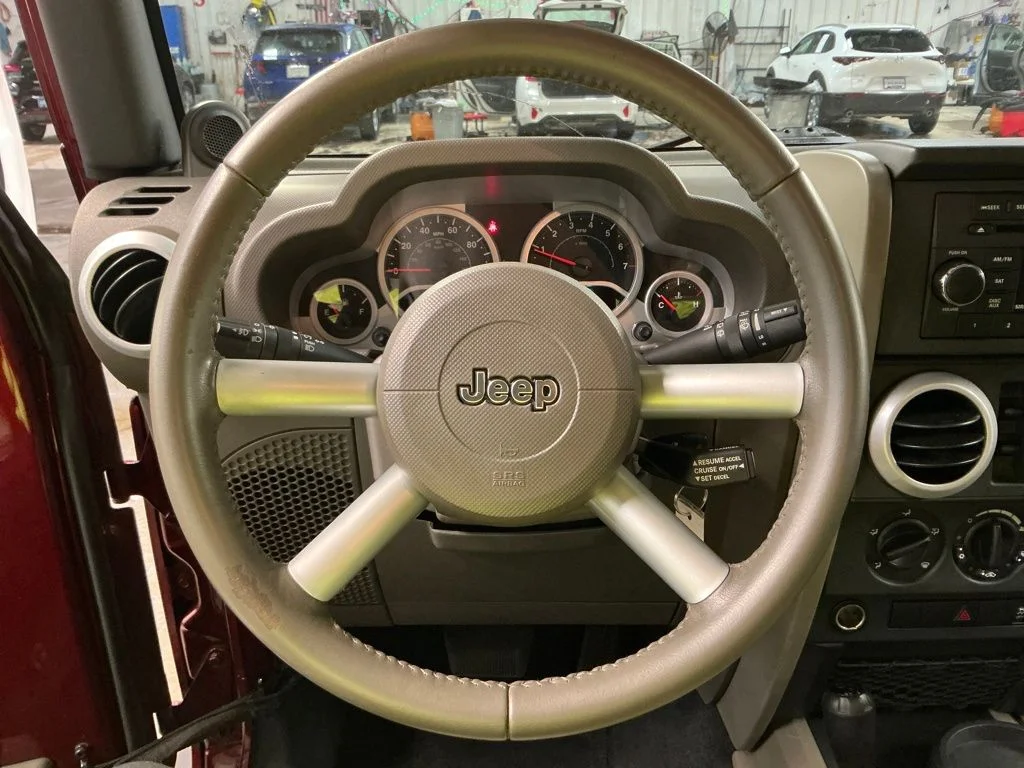 Used 2010 Red Jeep Unlimited Sahara image 18