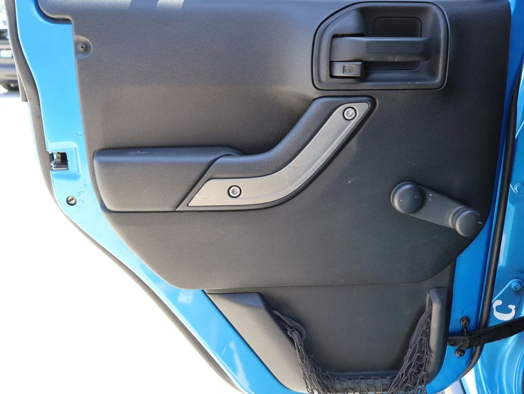 Used 2014 Blue Jeep Unlimited Sport image 15