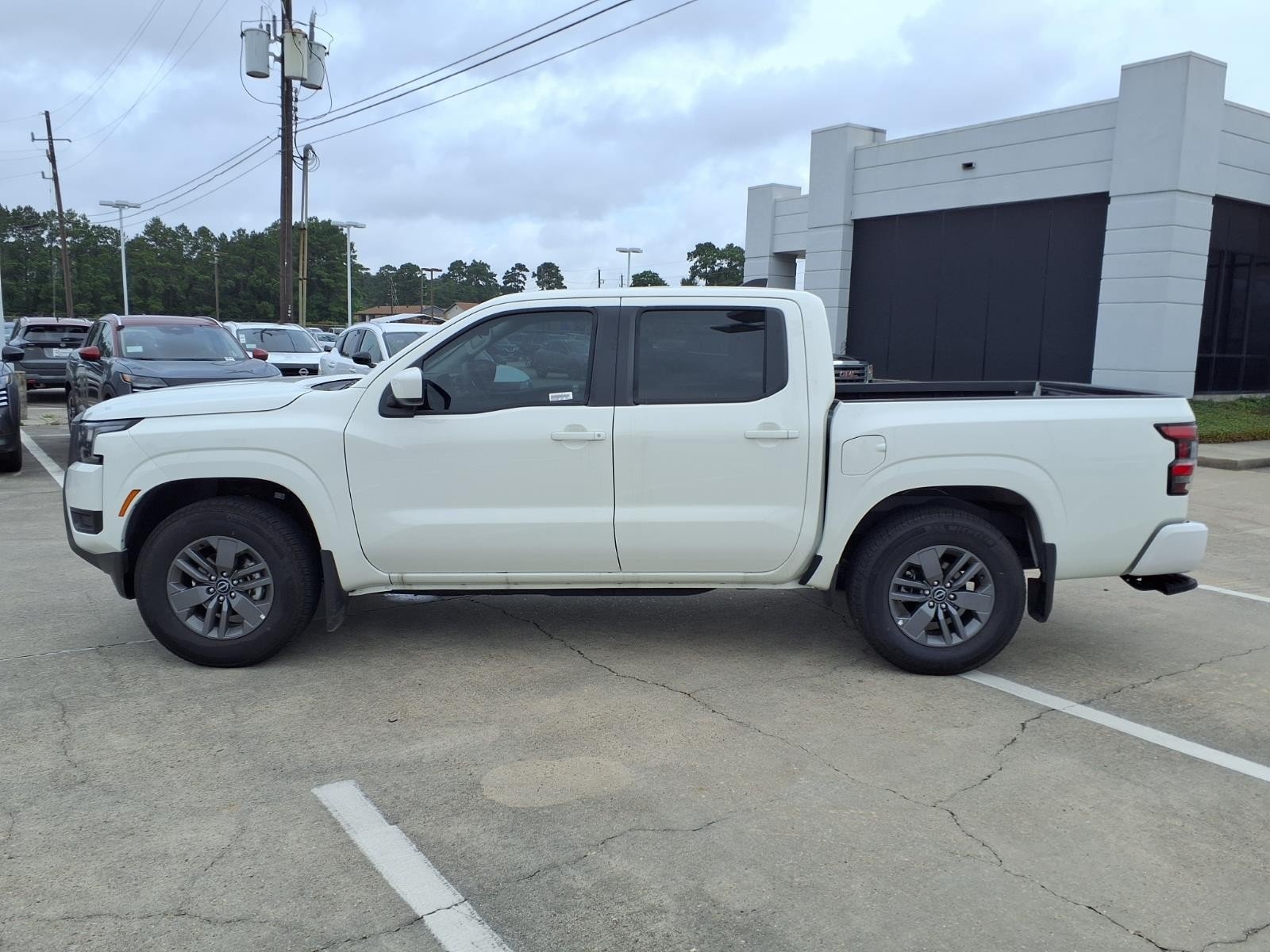2026 Nissan Frontier SV White at Robbins Nissan
