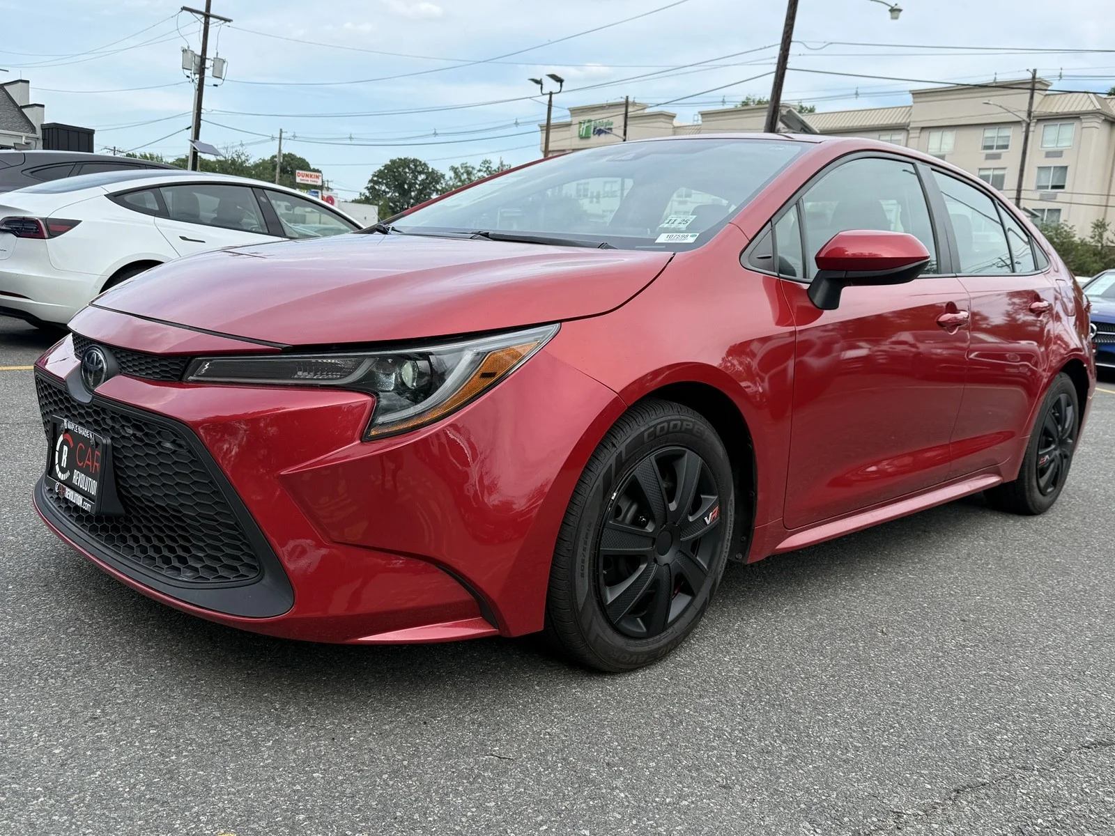 Used 2021 Barcelona Red Metallic Toyota LE image 3