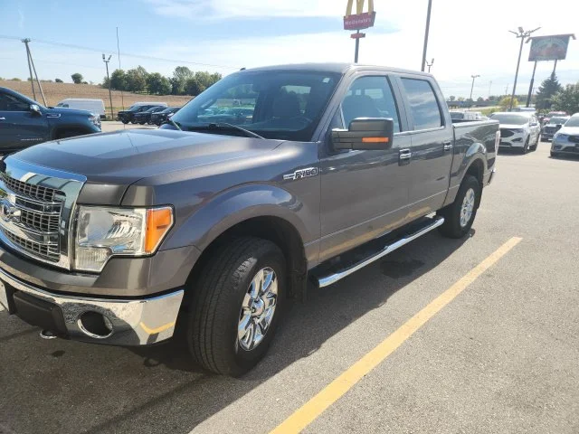 Used 2013 Sterling Gray Metallic Ford XLT image 1