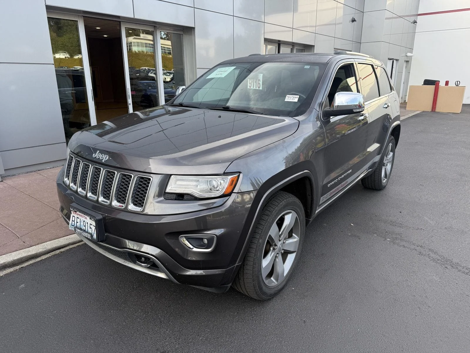 Used 2014 Granite Crystal Metallic Clearcoat Jeep Overland image 1