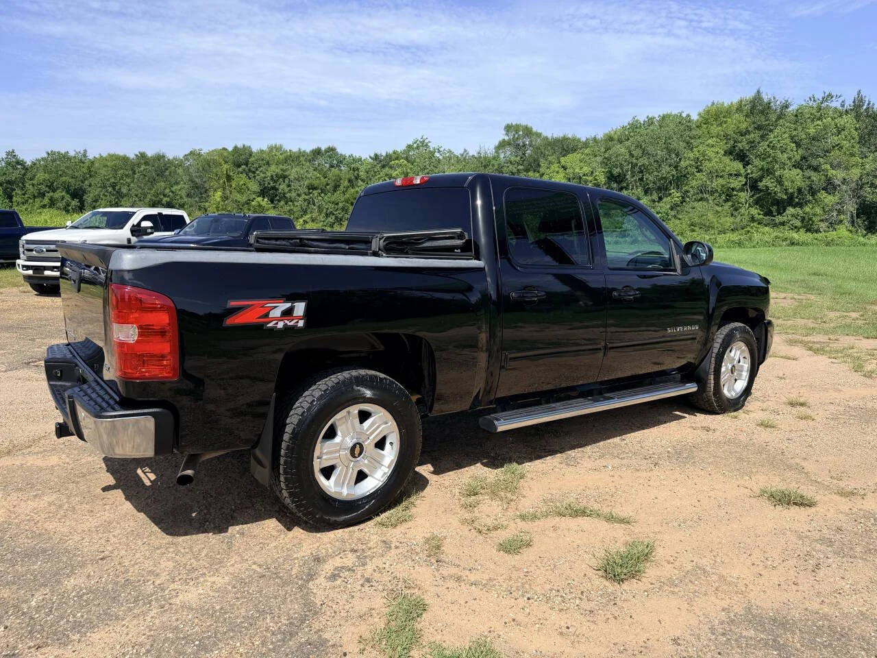 Used 2013 Black Chevrolet LTZ 4x4 4dr Crew Cab 5.8 ft. SB image 5