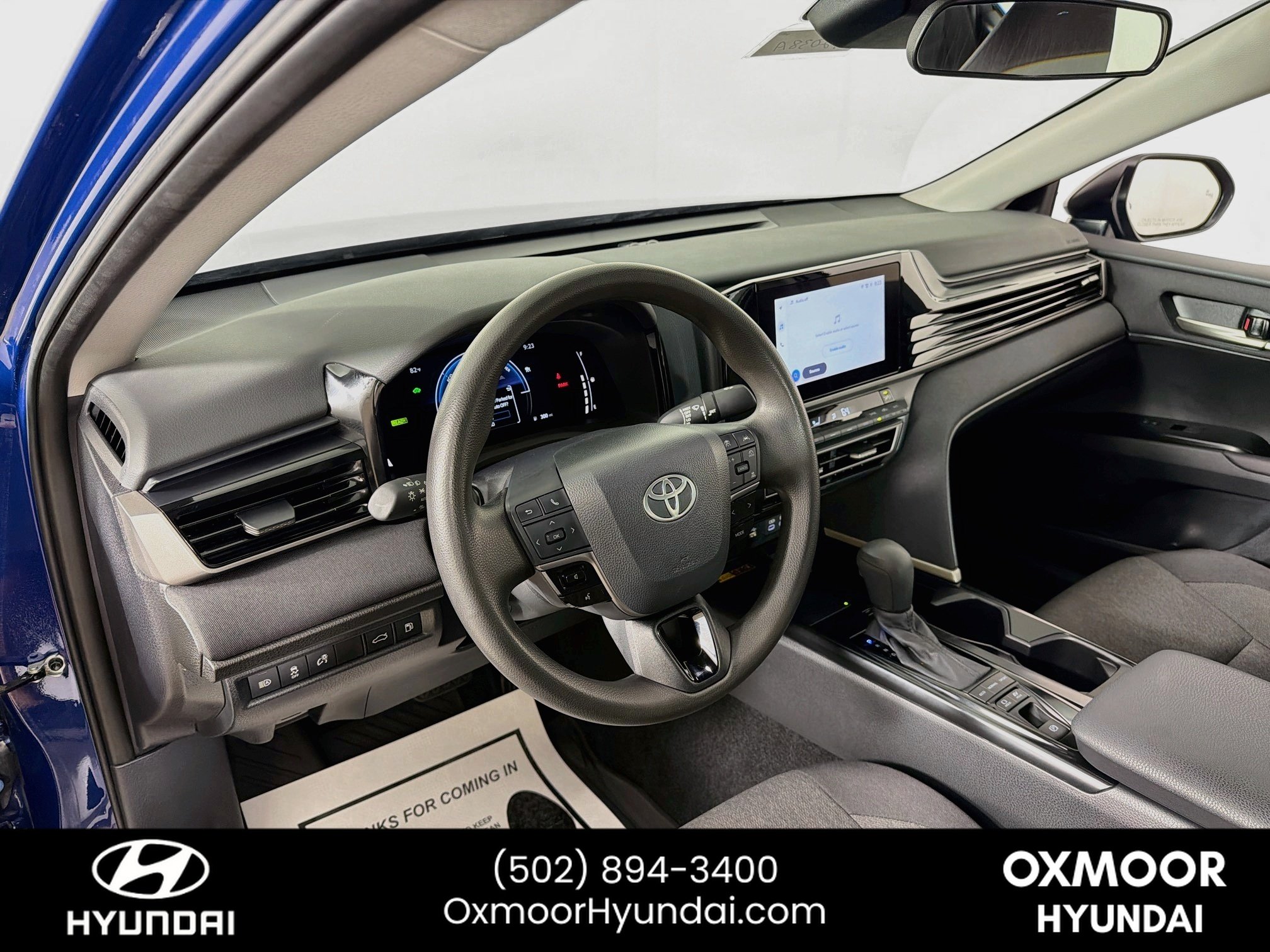 Used 2025 Reservoir Blue Toyota LE image 9