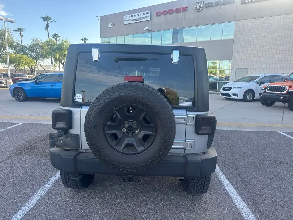 Used 2016 Silver Jeep Unlimited Sport image 5