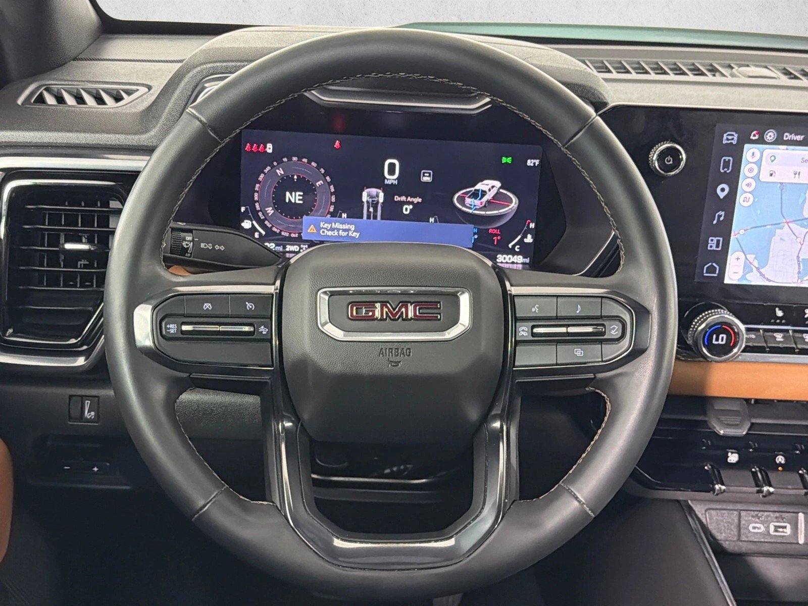 Used 2025 Summit White GMC 4WD AT4 image 24