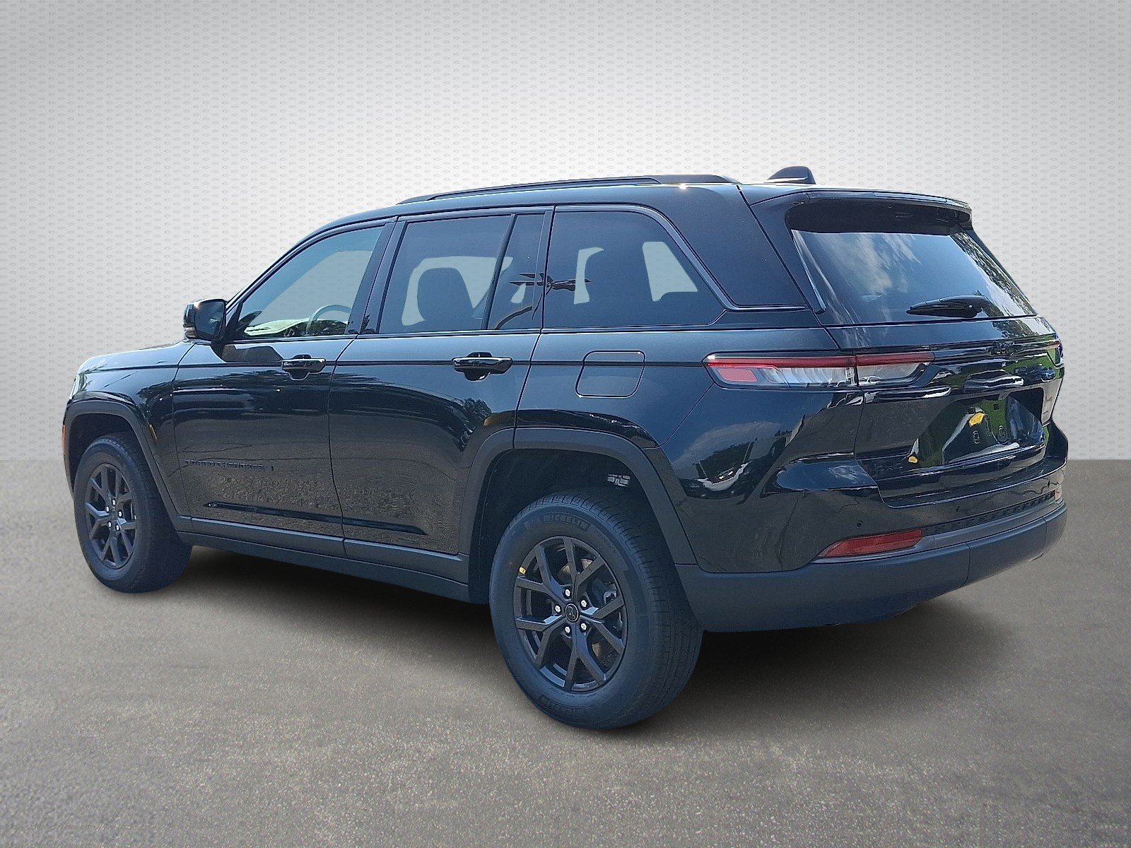 New 2027 High-Gloss Black Paint Jeep Laredo Altitude 4x4 image 3
