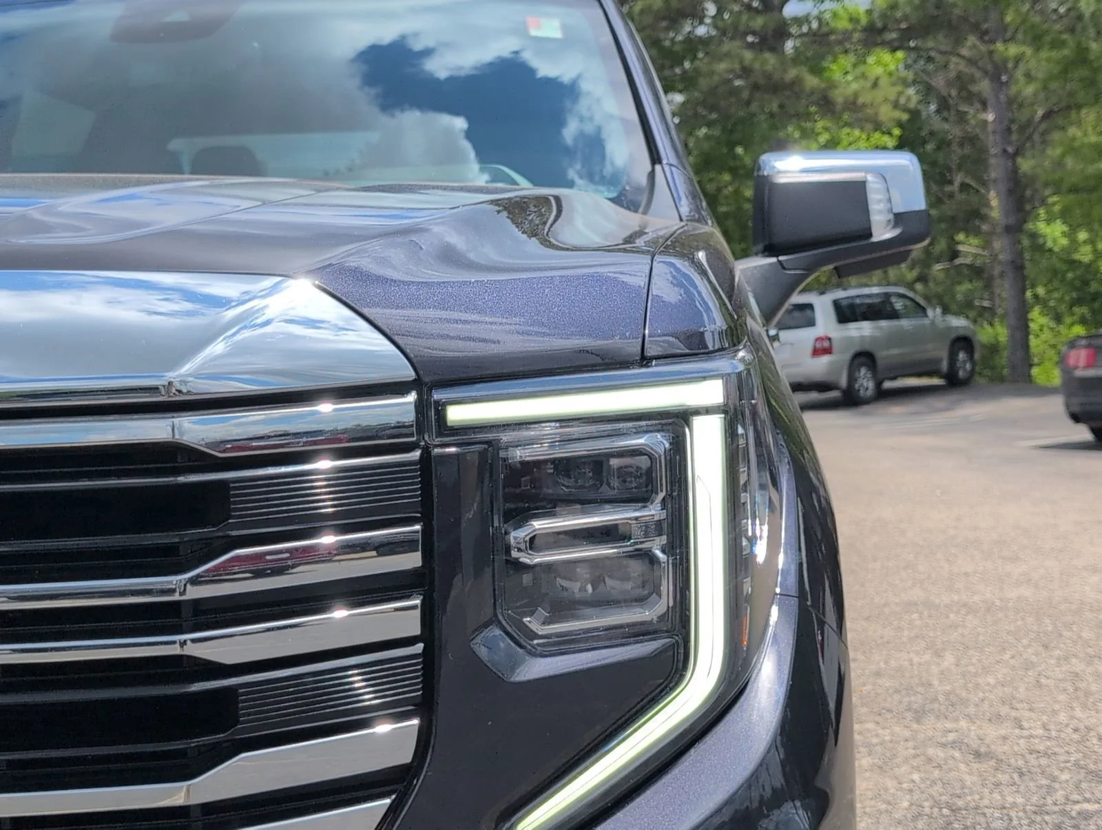 Used 2023 Titanium Rush Metallic GMC SLT image 12